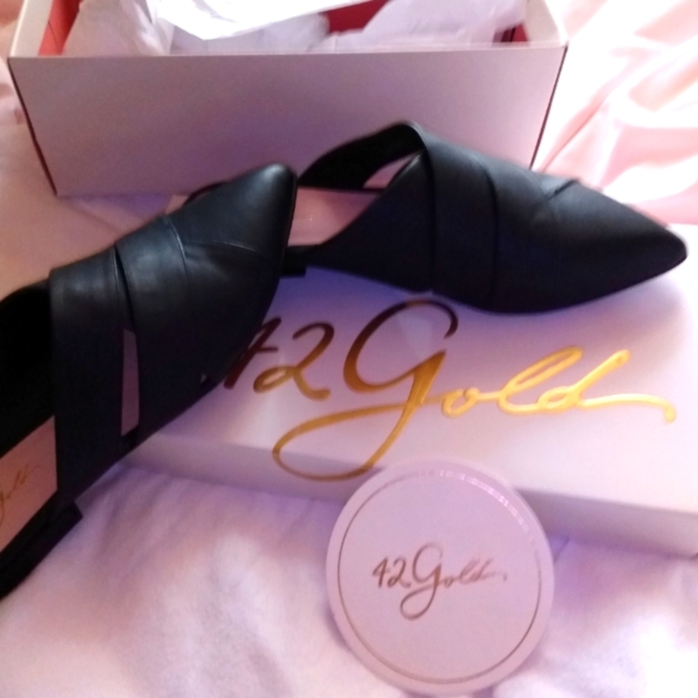 black leather flats / slides 9